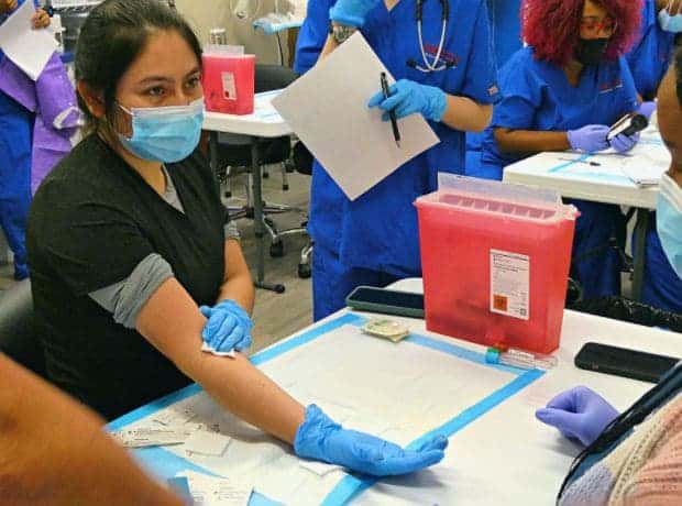 medical assistant working in a healthcare clinic