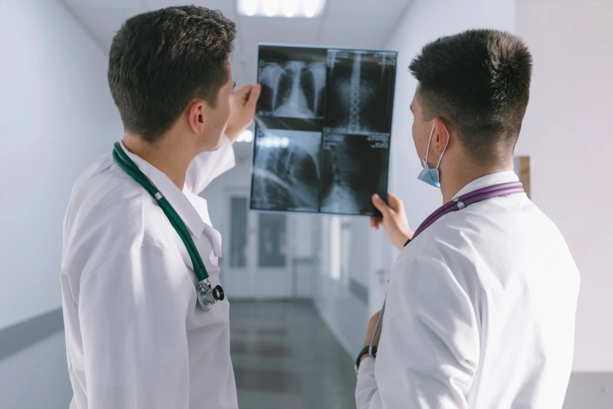 A physician examining radiography