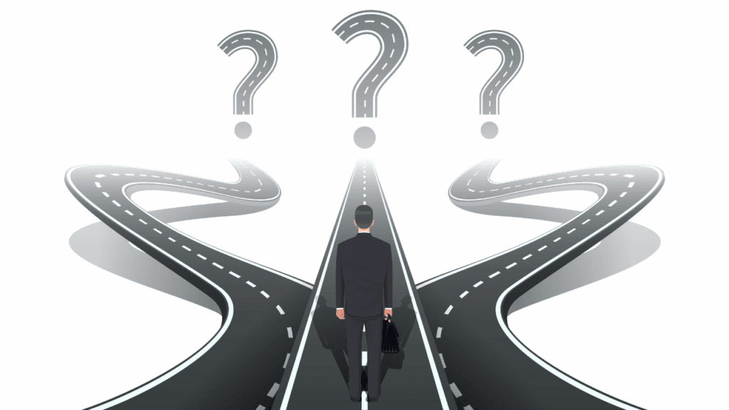 A person stands at a fork in the road with three paths, each marked by a question mark signifying confusion about a career path.