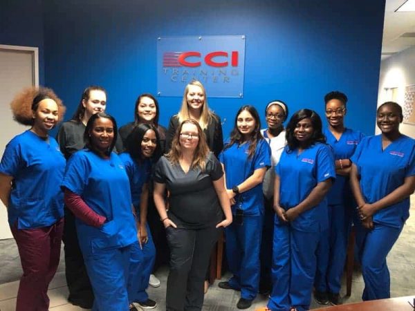 group of graduates from CCI Training Center's medical and healthcare program